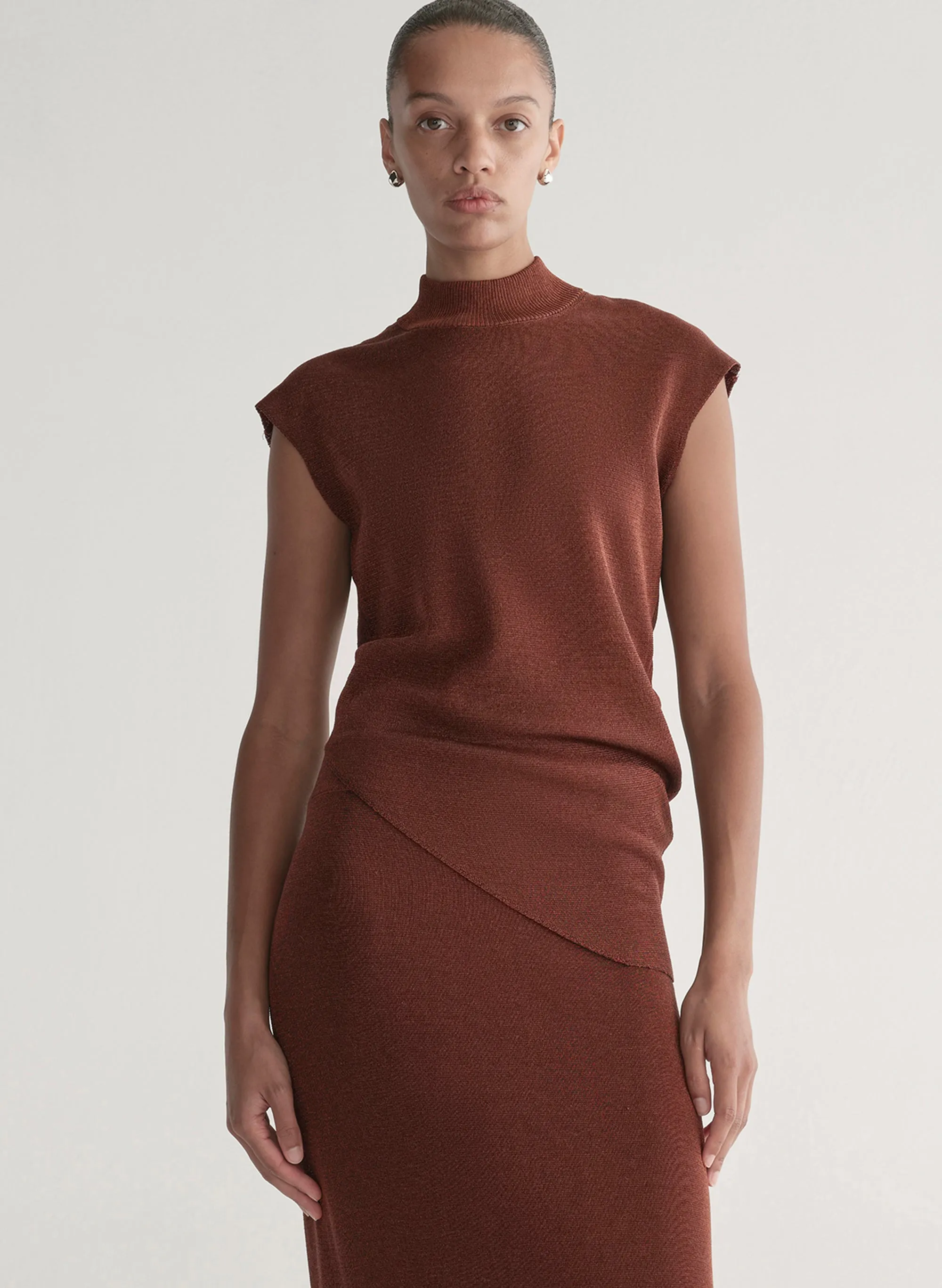 Edith Metallic Knit Asymmetric Top sold by A.L.C.