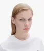 Clef stud earrings sold by A.P.C.