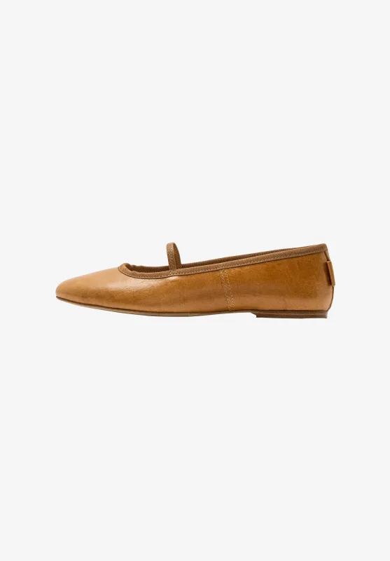 Swan ballet flats sold by A.P.C.