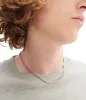 Minimalist necklace sold by A.P.C.