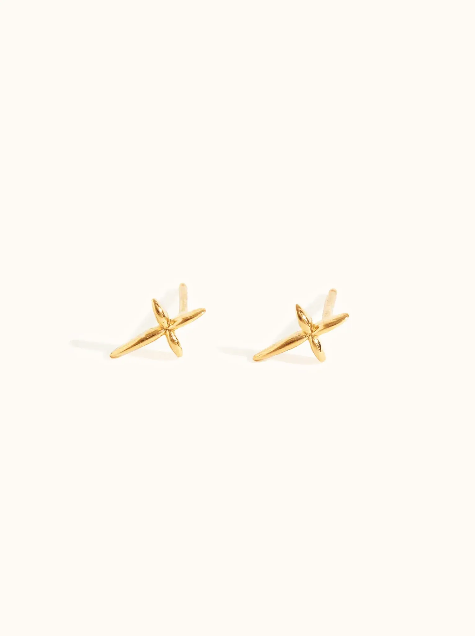 Droplet Cross Studs sold by Able