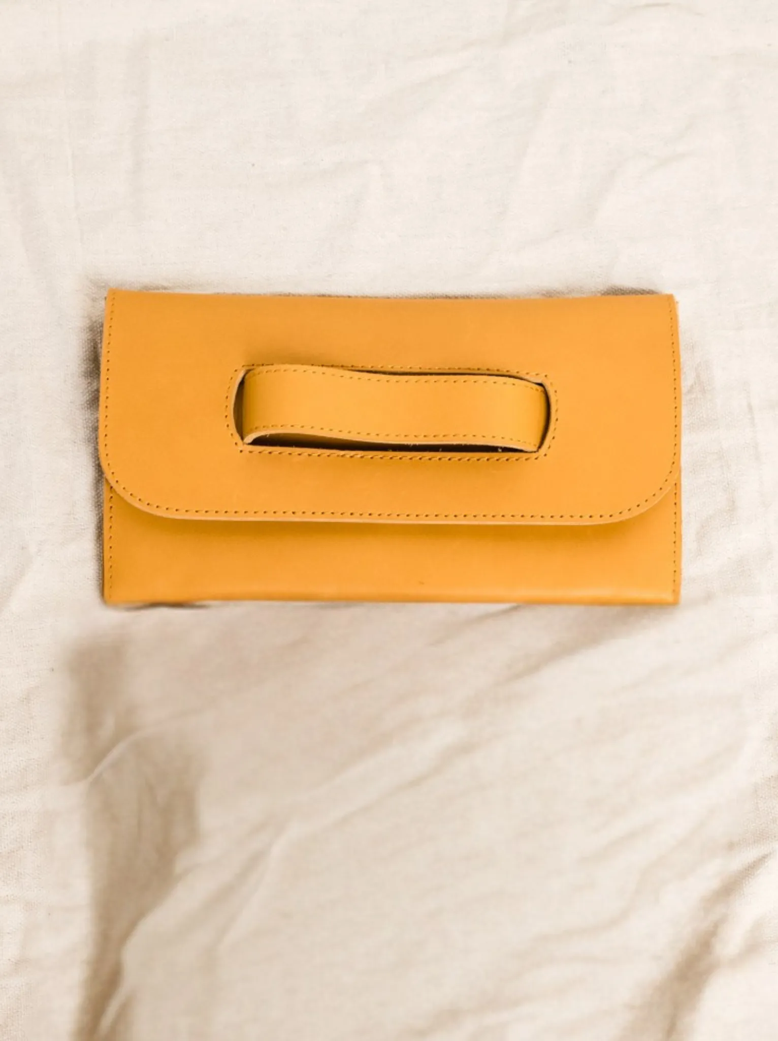 Mare Handle Clutch sold by Able