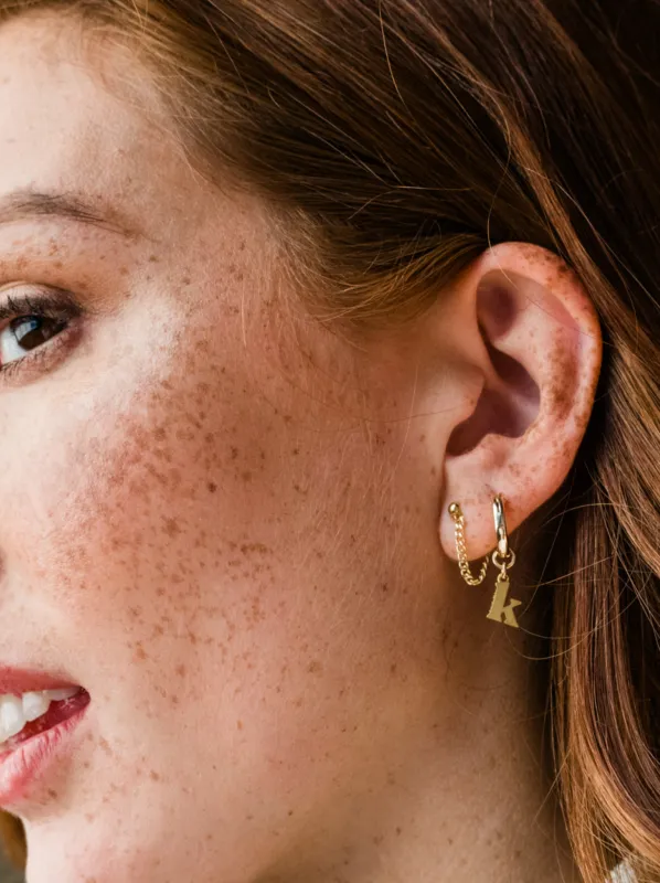 Initial Charm Huggie Hoop sold by Able