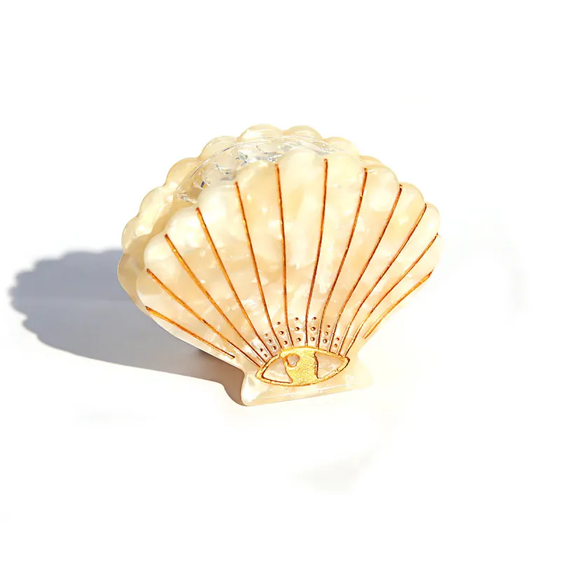 White Shell Claw Clip sold by About A Girl