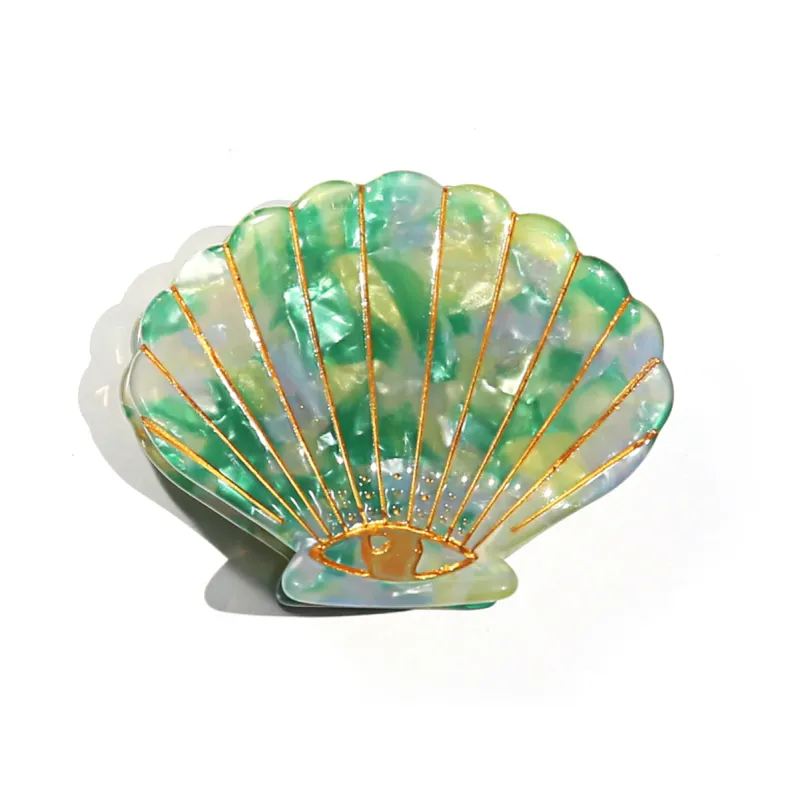 Green Speckle Shell Claw Clip sold by About A Girl