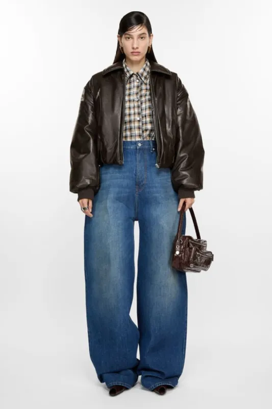 Coated bomber jacket sold by Acne Studios