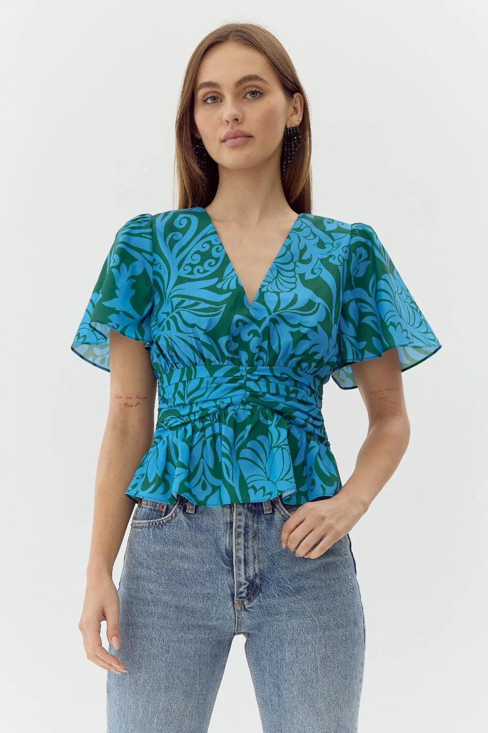 Arlene Peplum Blouse sold by Adelyn Rae