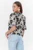 Darby 3D Embroidered Scalloped Hem Blouse sold by Adelyn Rae