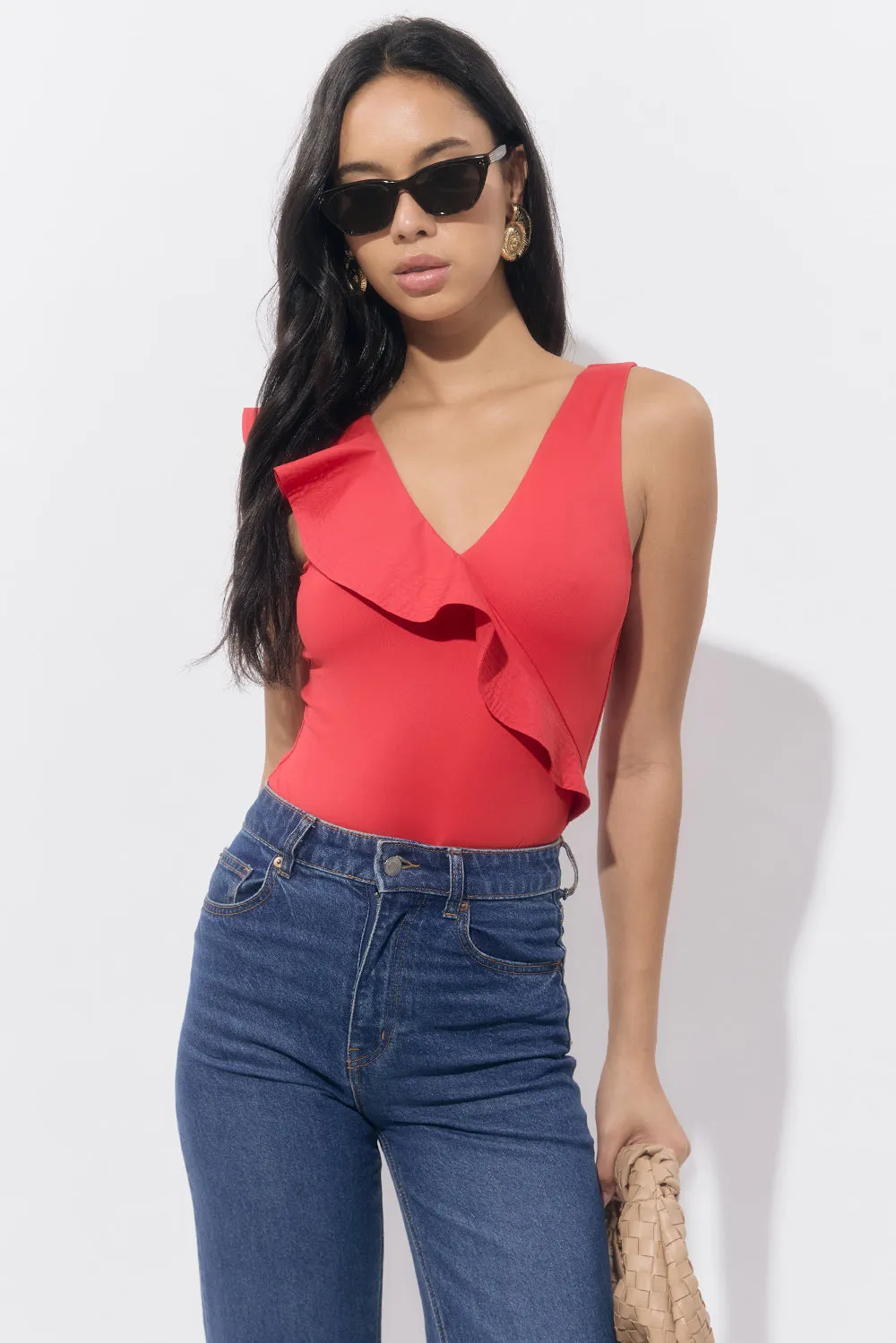 Palmas Asymmetrical Ruffle Bodysuit sold by Adelyn Rae