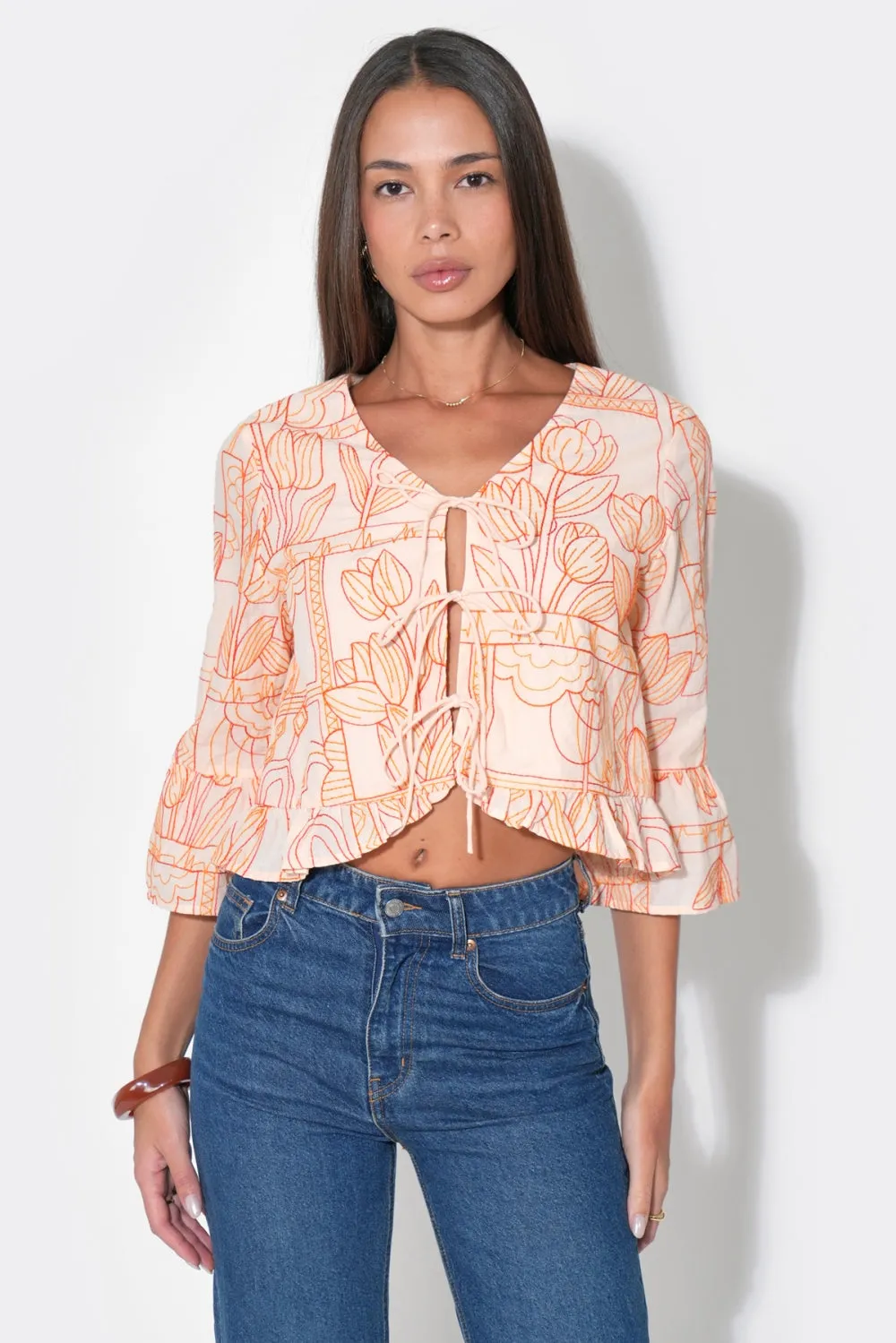 Rosalie Tie Front Ruffle Sleeve Embroiled Top sold by Adelyn Rae