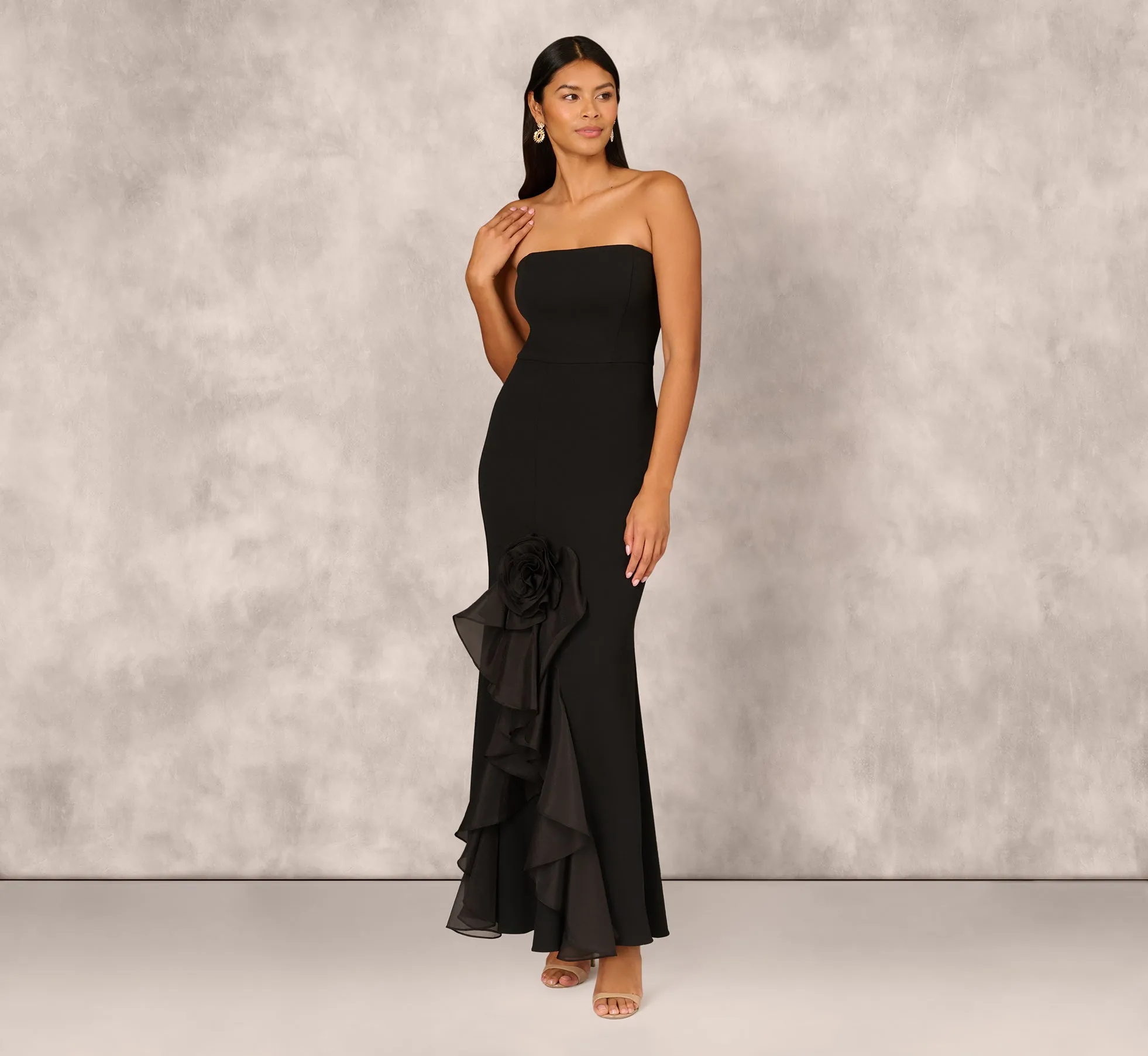Crepe Strapless Mermaid Gown With Organza Ruffle Skirt In Black sold by Adrianna Papell