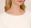 Stretch Crepe Jumpsuit With Feather Trim Bell Sleeves In Ivory sold by Adrianna Papell