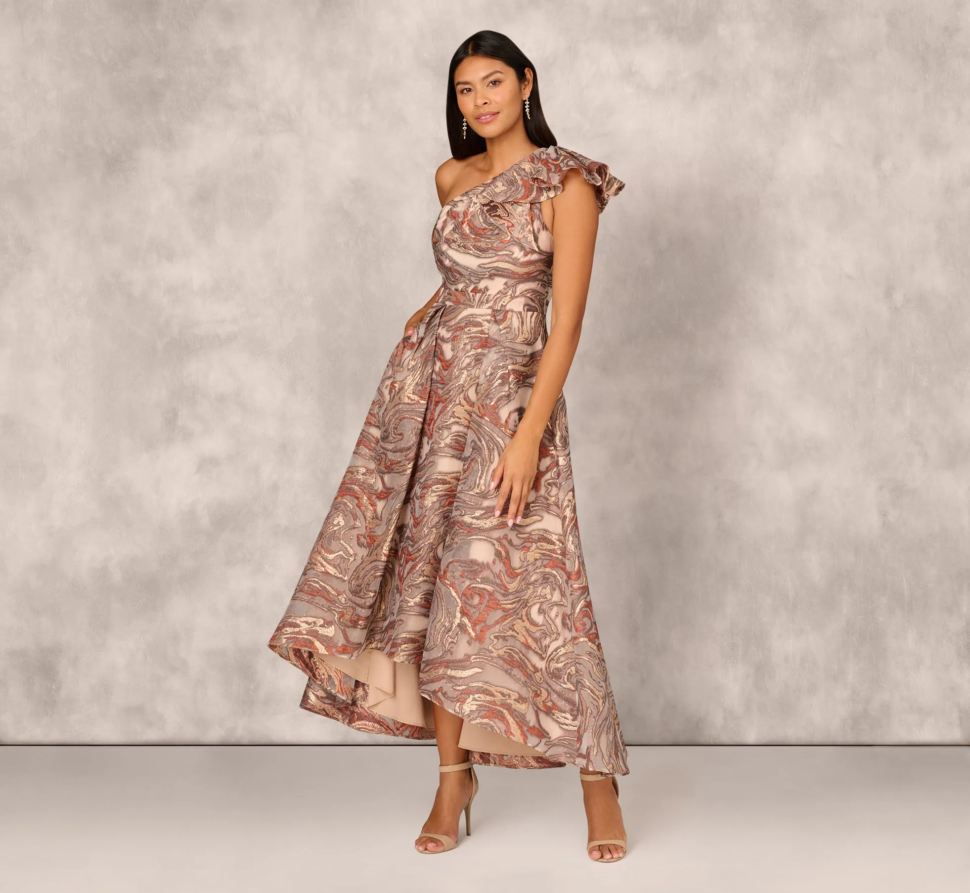 Clipped Jacquard High Low Gown With Ruffle One Shoulder Neck In Rust Multi sold by Adrianna Papell