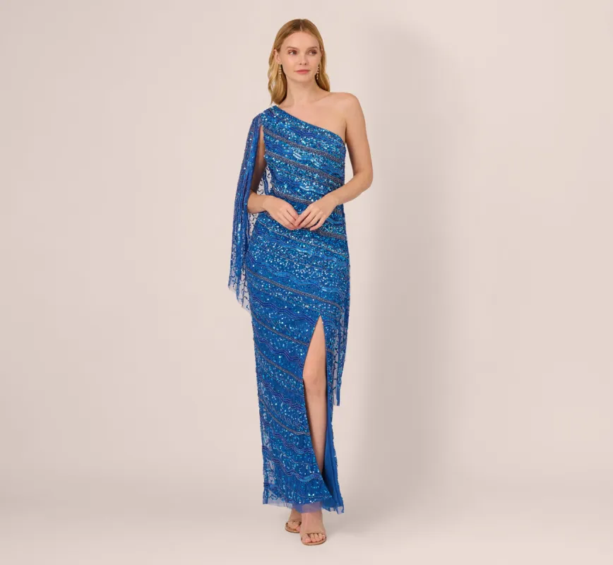 One Shoulder Beaded Column Gown With Draped Sleeve In Blue Horizon sold by Adrianna Papell