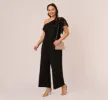Plus Size One Shoulder Crepe Jumpsuit With Lace Ruffle Details In Black sold by Adrianna Papell