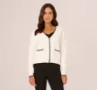 Cardigan Sweater With Contrast Scallop Trim In Ivory Black sold by Adrianna Papell