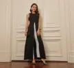Colorblock Jumpsuit With Skirt Overlay In Black Ivory sold by Adrianna Papell