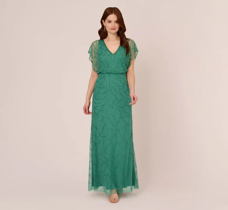 Beaded Blouson Mermaid Gown With Sheer Dolman Sleeves In Jungle Green sold by Adrianna Papell