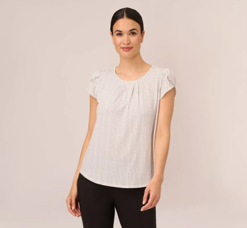 Short Sleeve Printed Top With Pleated Details In Ivory Black Seed Dot sold by Adrianna Papell