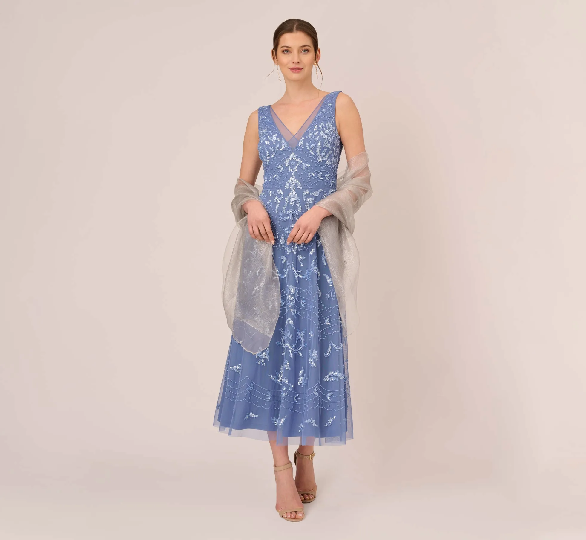 Metallic Sheer Wrap In Silver sold by Adrianna Papell