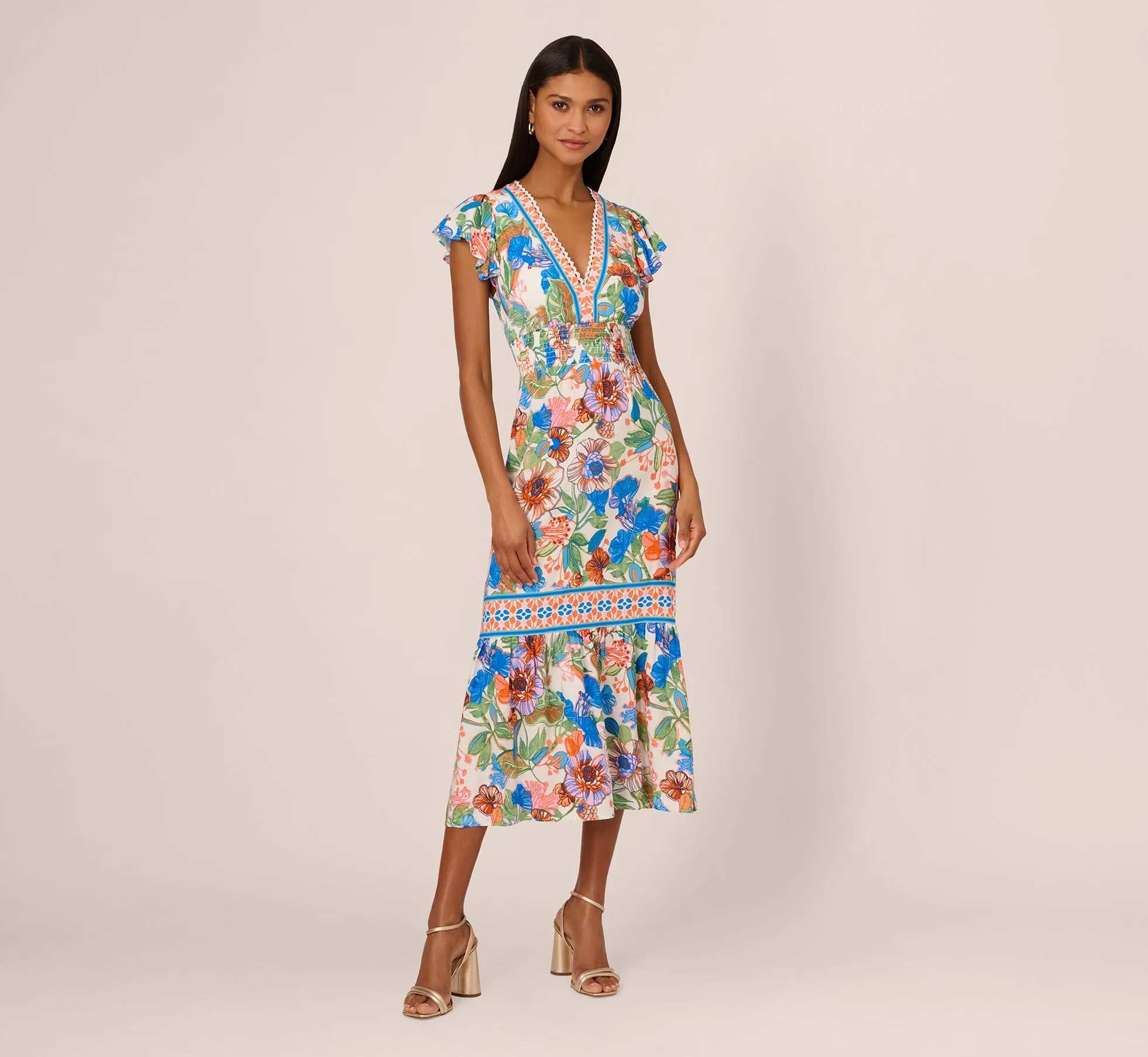 Bright Floral Print Midi Dress With Flutter Sleeves In Blue-Green Multi sold by Adrianna Papell