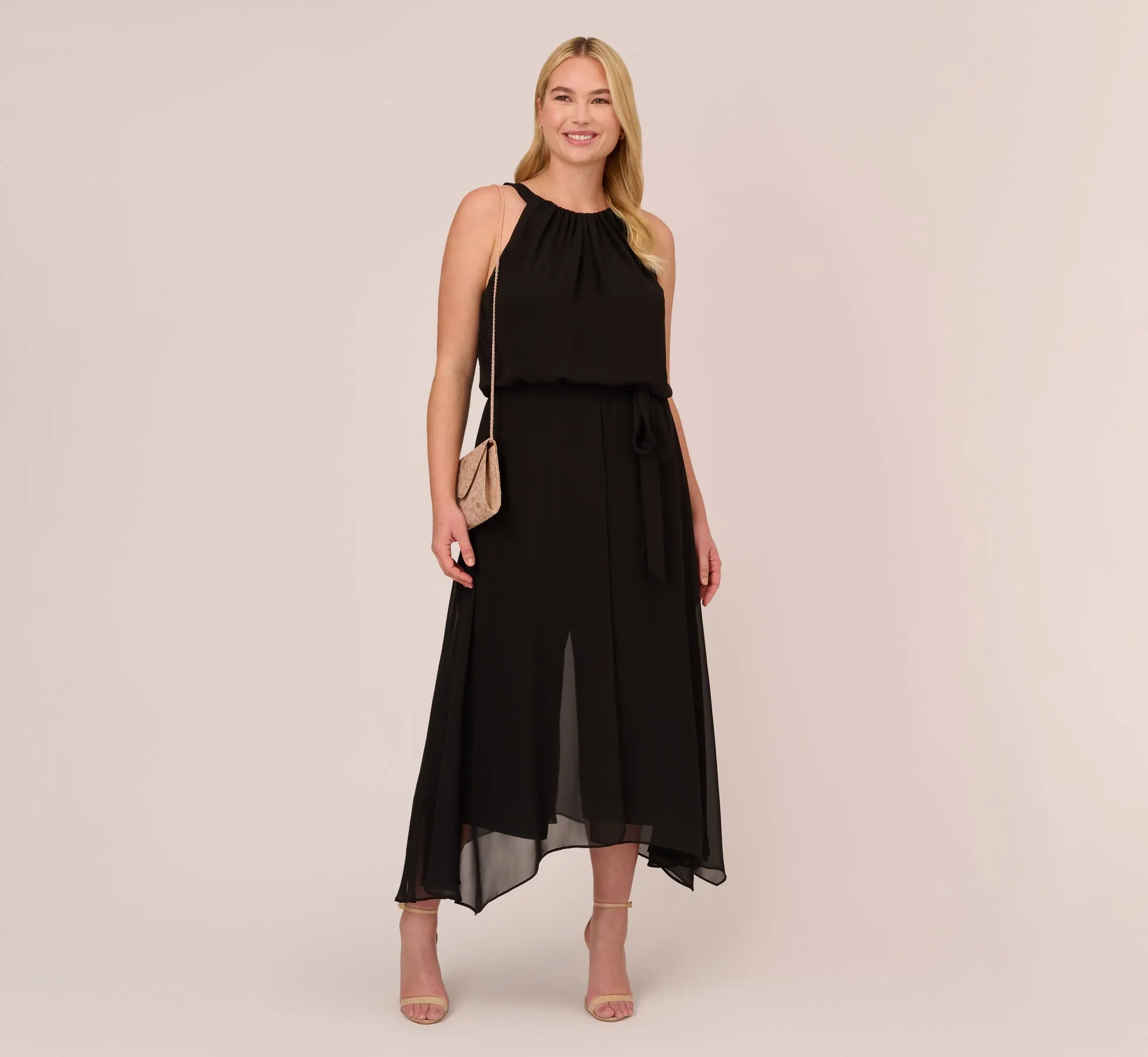 Plus Size Halter Jumpsuit With Chiffon Overlay Skirt In Black sold by Adrianna Papell