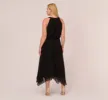 Plus Size Halter Jumpsuit With Chiffon Overlay Skirt In Black sold by Adrianna Papell