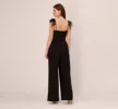 Crepe Wide Leg Jumpsuit With Bead And Feather Accents In Black sold by Adrianna Papell
