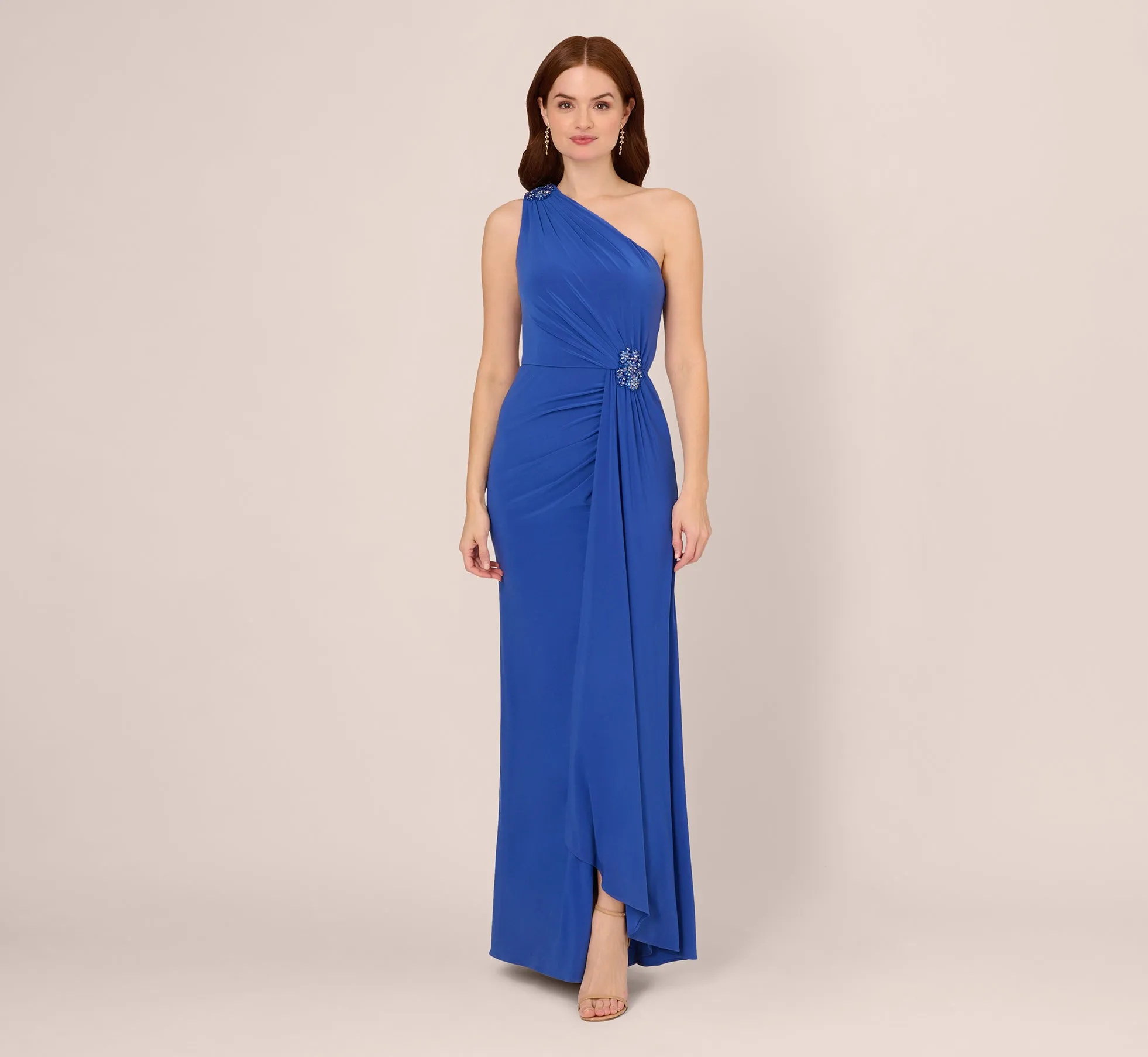One Shoulder Draped Jersey Gown With Floral Sequin Accents In Brilliant Sapphire sold by Adrianna Papell