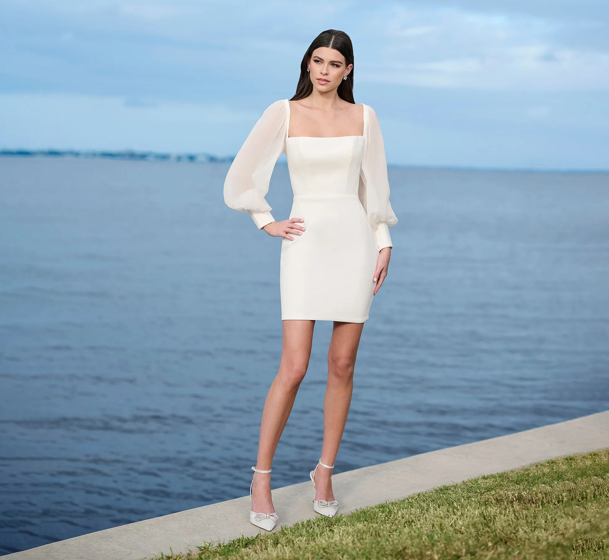 Crepe Short Skirt With Silk Chiffon Sleeves And Tie-Bow Back Straps In Ivory sold by Adrianna Papell