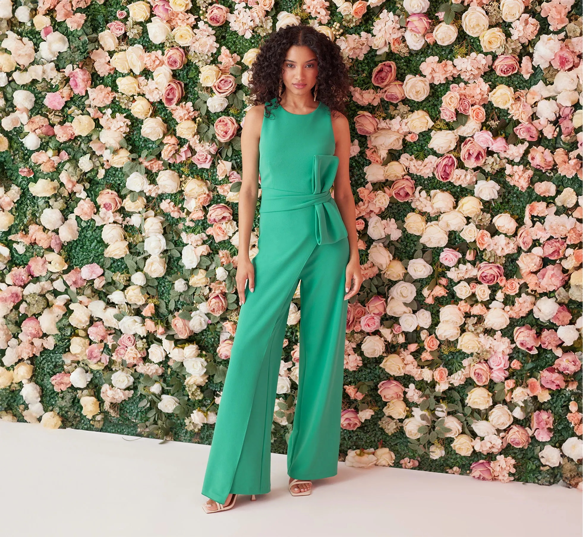 Wide Leg Crepe Jumpsuit With Bow Accent In Botanic Green sold by Adrianna Papell