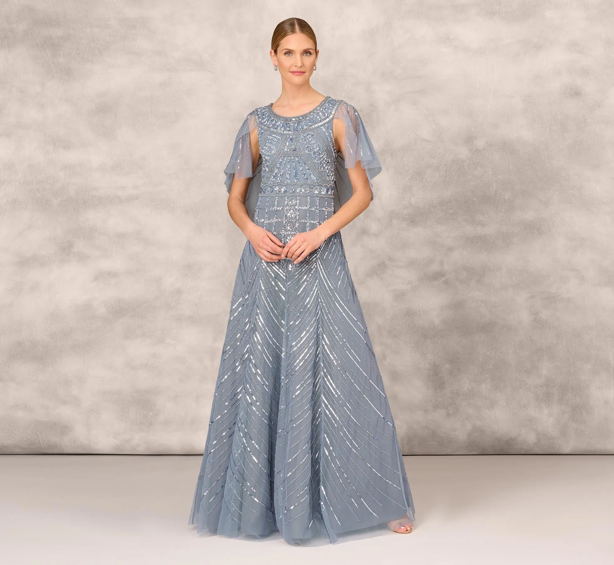 Beaded Ball Gown With Cape Sleeves In Vintage Blue sold by Adrianna Papell