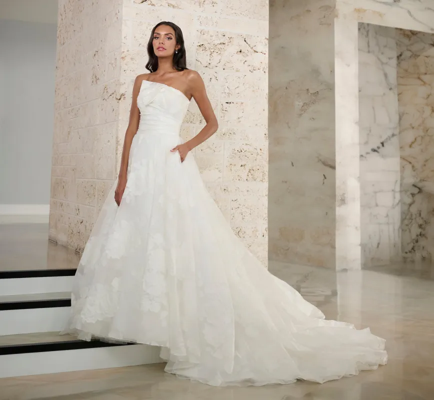 Textured Organza A-Line Gown With Detachable Bow In Ivory sold by Adrianna Papell