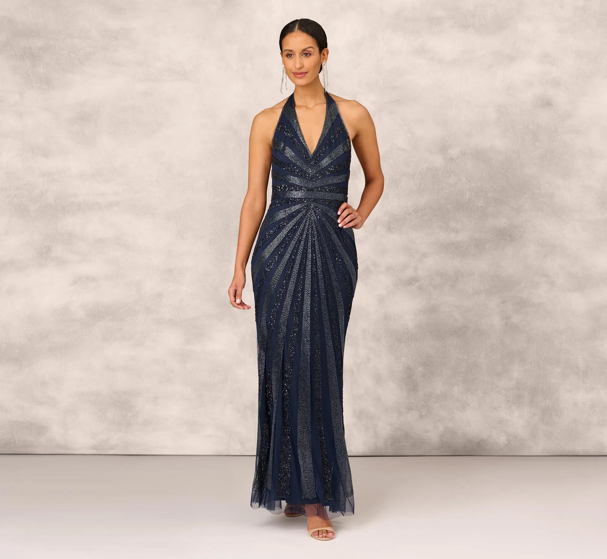 Dazzling Beaded Halter Gown With Deep V-Neckline In Navy sold by Adrianna Papell