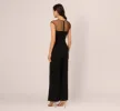 Wide Leg Jumpsuit With Illusion Neck And Cap Sleeves In Black sold by Adrianna Papell