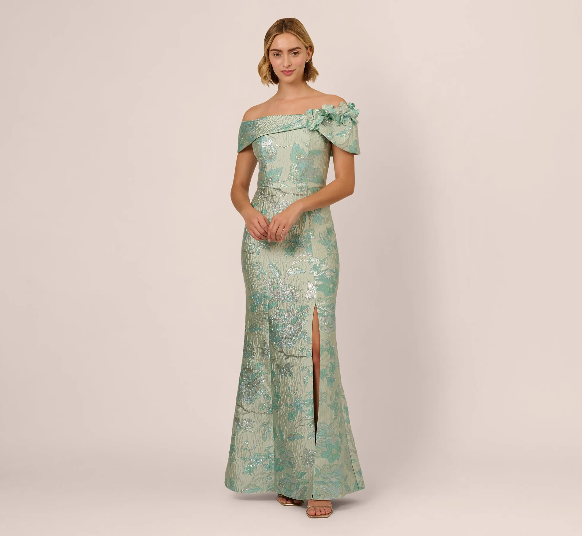 Off Shoulder Floral Jacquard Mermaid Gown In Icy Sage sold by Adrianna Papell
