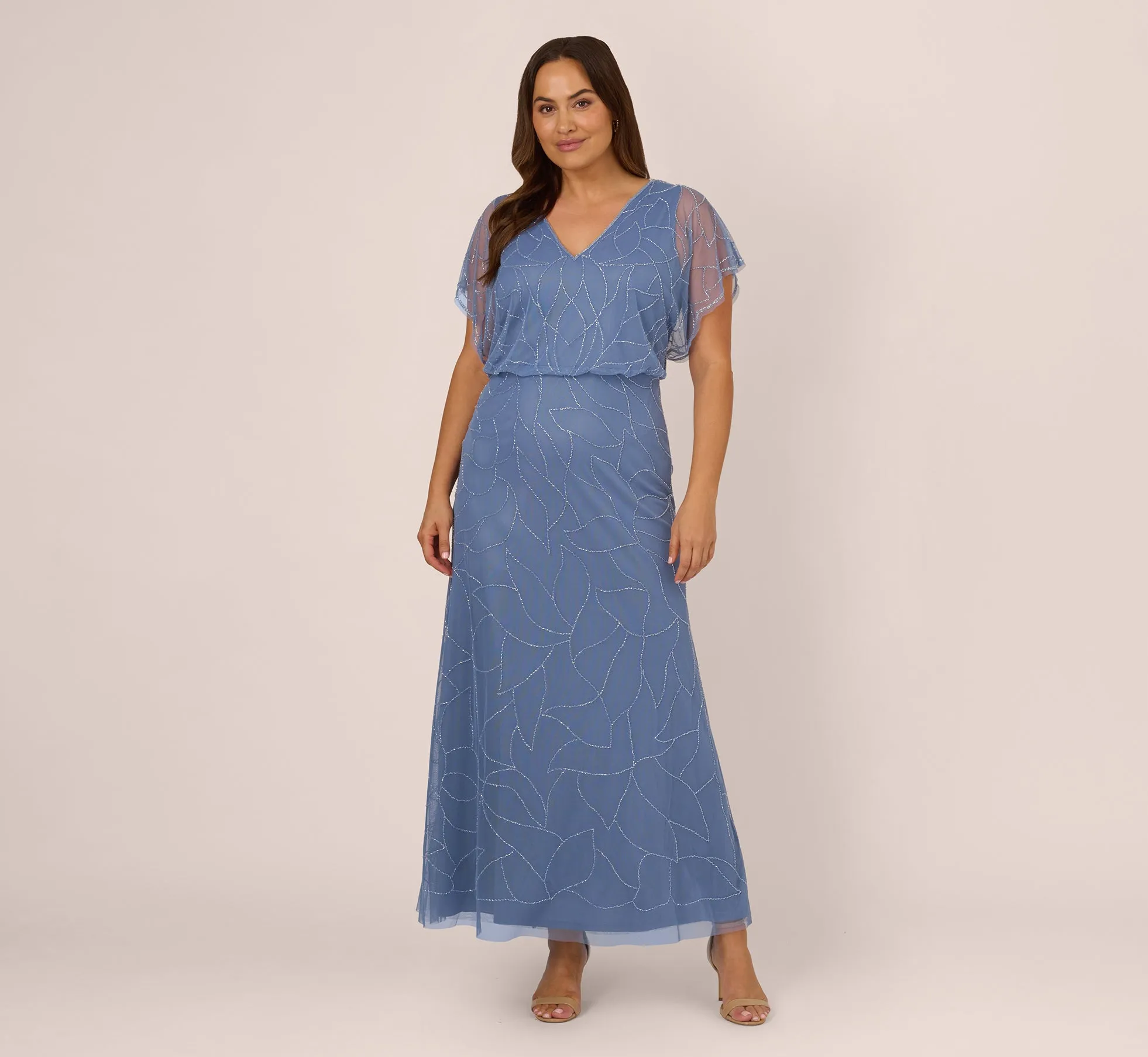 Plus Size Beaded Blouson Mermaid Gown With Sheer Dolman Sleeves In French Blue sold by Adrianna Papell