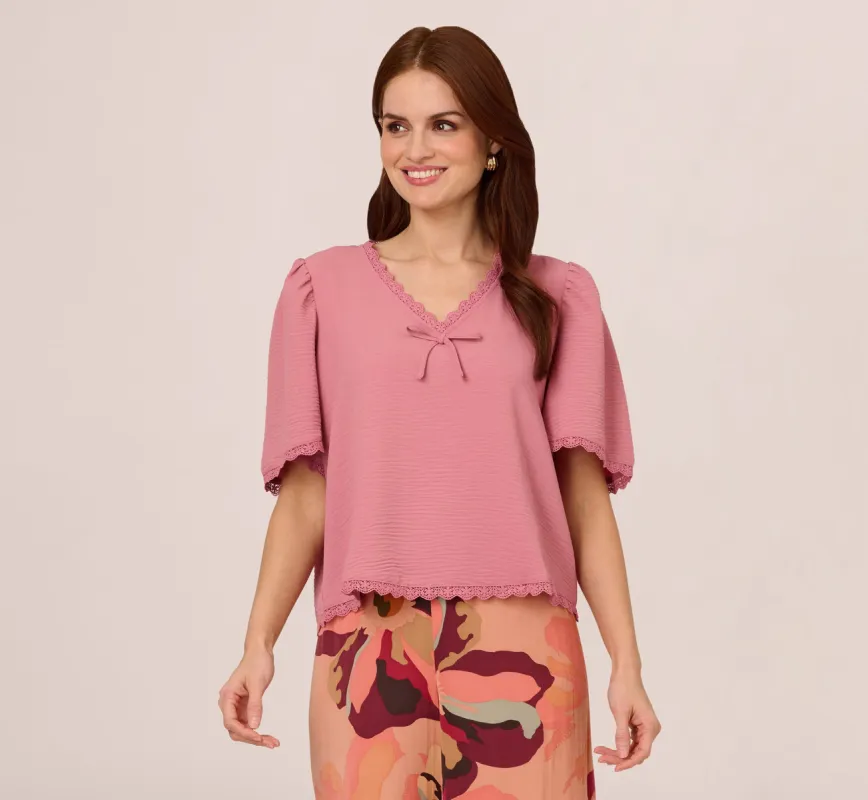 Short Sleeve Crochet Trim Top In Mesa Rose sold by Adrianna Papell