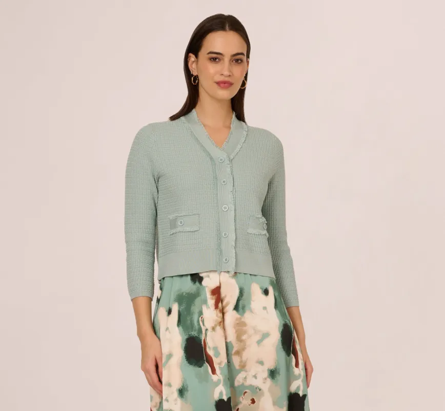 Waffle Knit Cardigan Sweater With Frayed Edges In Dusty Seamist sold by Adrianna Papell