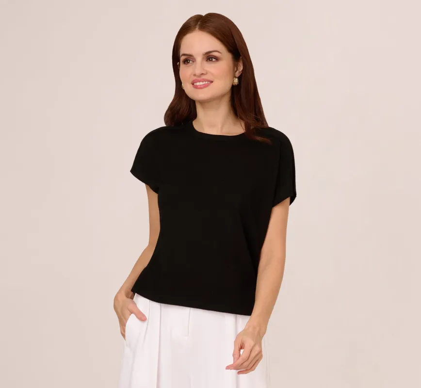 Short Sleeve Exposed Seam Pullover Sweater In Black sold by Adrianna Papell