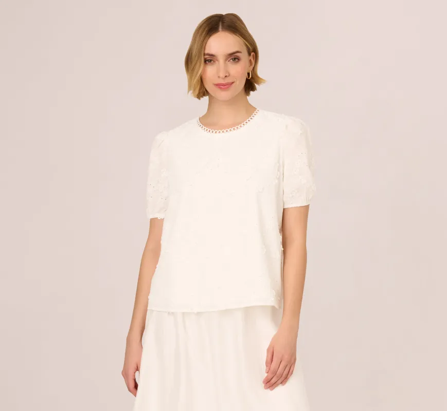 Short Sleeve 3D Eyelet Top In White sold by Adrianna Papell