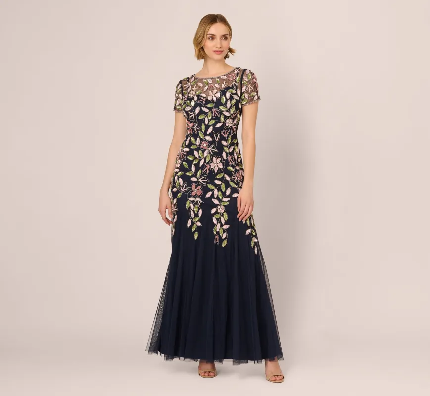 Short Sleeve Vine Beaded Godet Gown In Navy Multi sold by Adrianna Papell