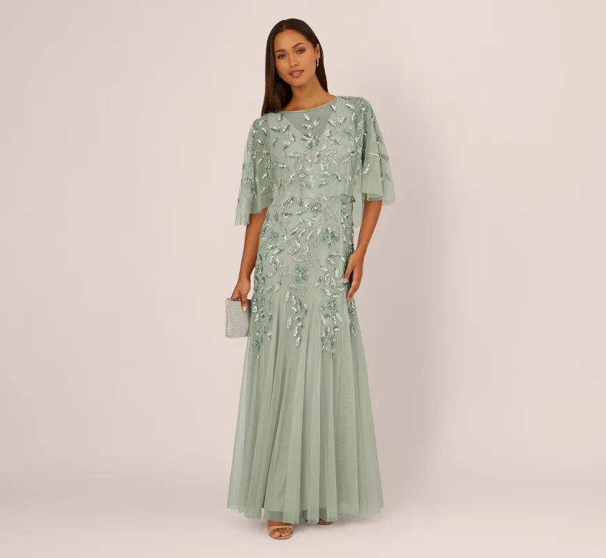 Floral Beaded Godet Cape Gown In Aqua Dust sold by Adrianna Papell