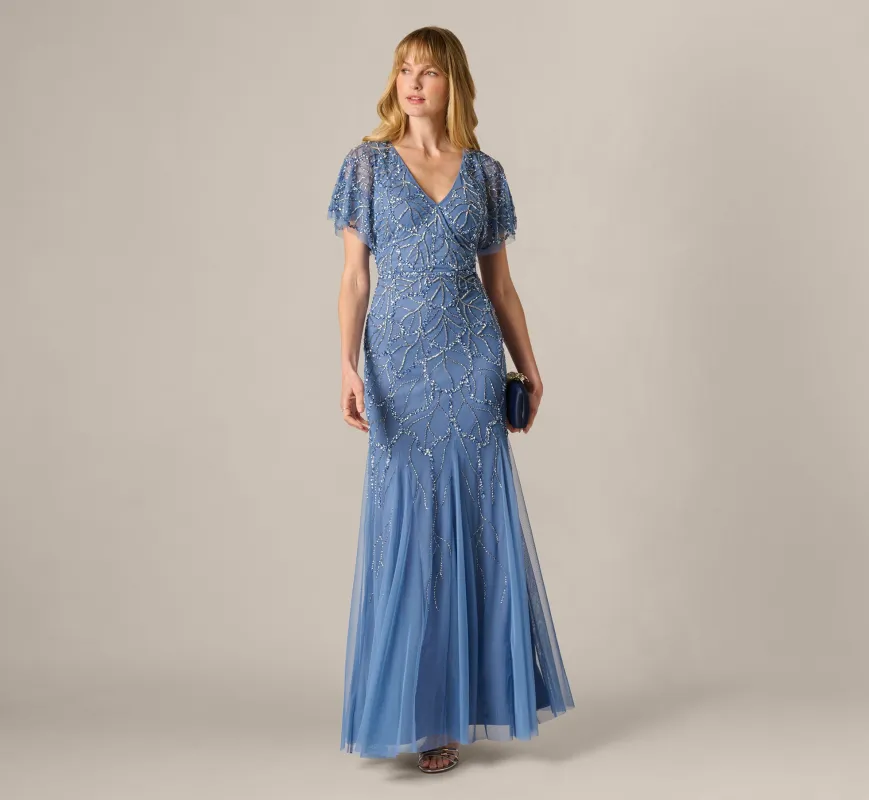 Flutter Sleeve Surplice Beaded Gown In French Blue sold by Adrianna Papell