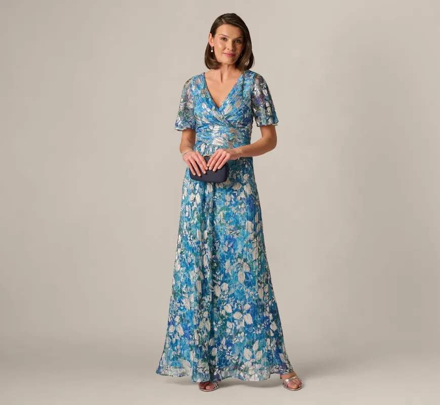 Flutter Sleeve Crinkle Foil Floral Gown In Blue Multi sold by Adrianna Papell