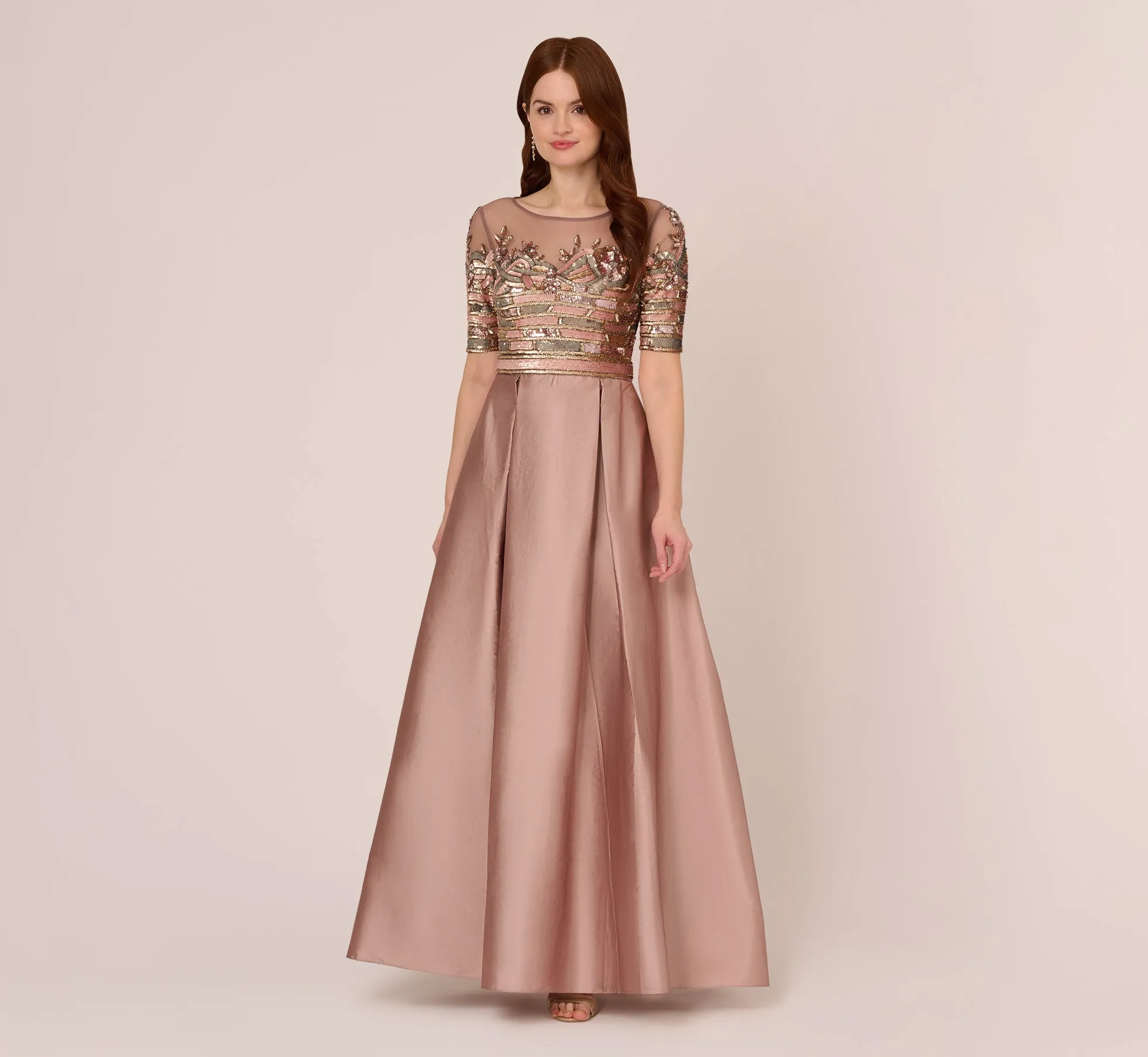 Embellished Taffeta Gown With Sheer Elbow Length Sleeves In Stone sold by Adrianna Papell