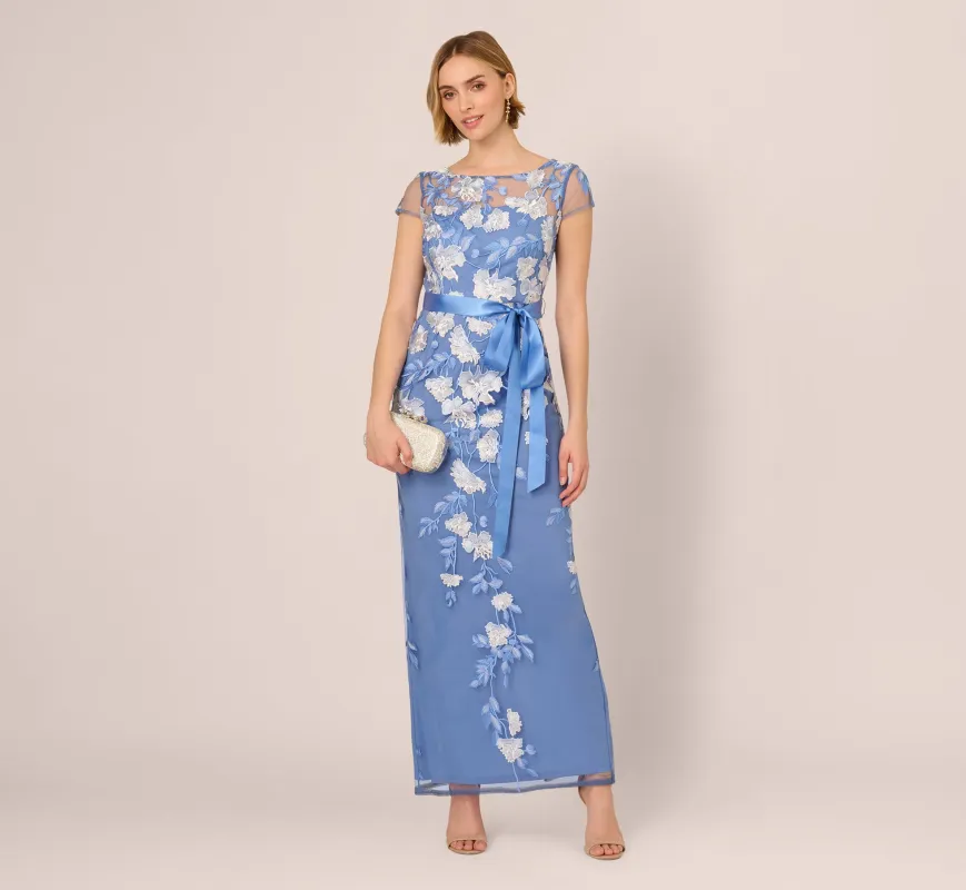 Short Sleeve Floral Embroidered Gown With Ribbon Tie Waist In French Blue Multi made by Adrianna Papell