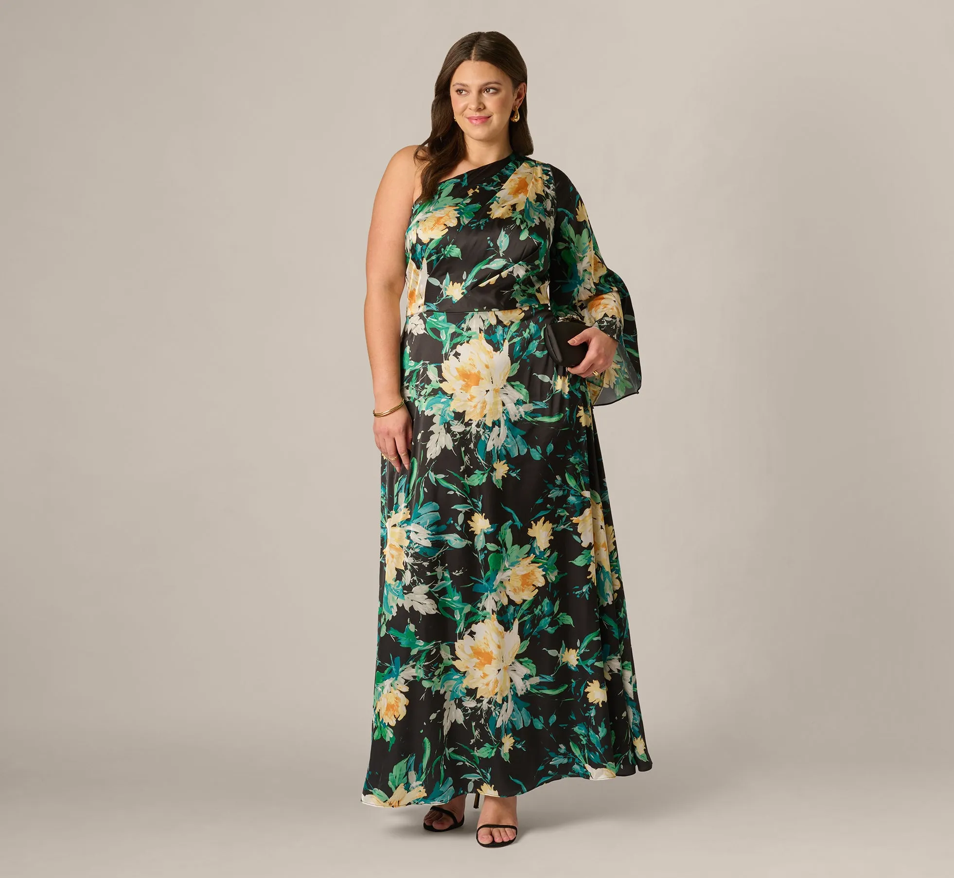 Plus Size One Shoulder Long Sleeve Floral Satin Gown In Black Multi sold by Adrianna Papell