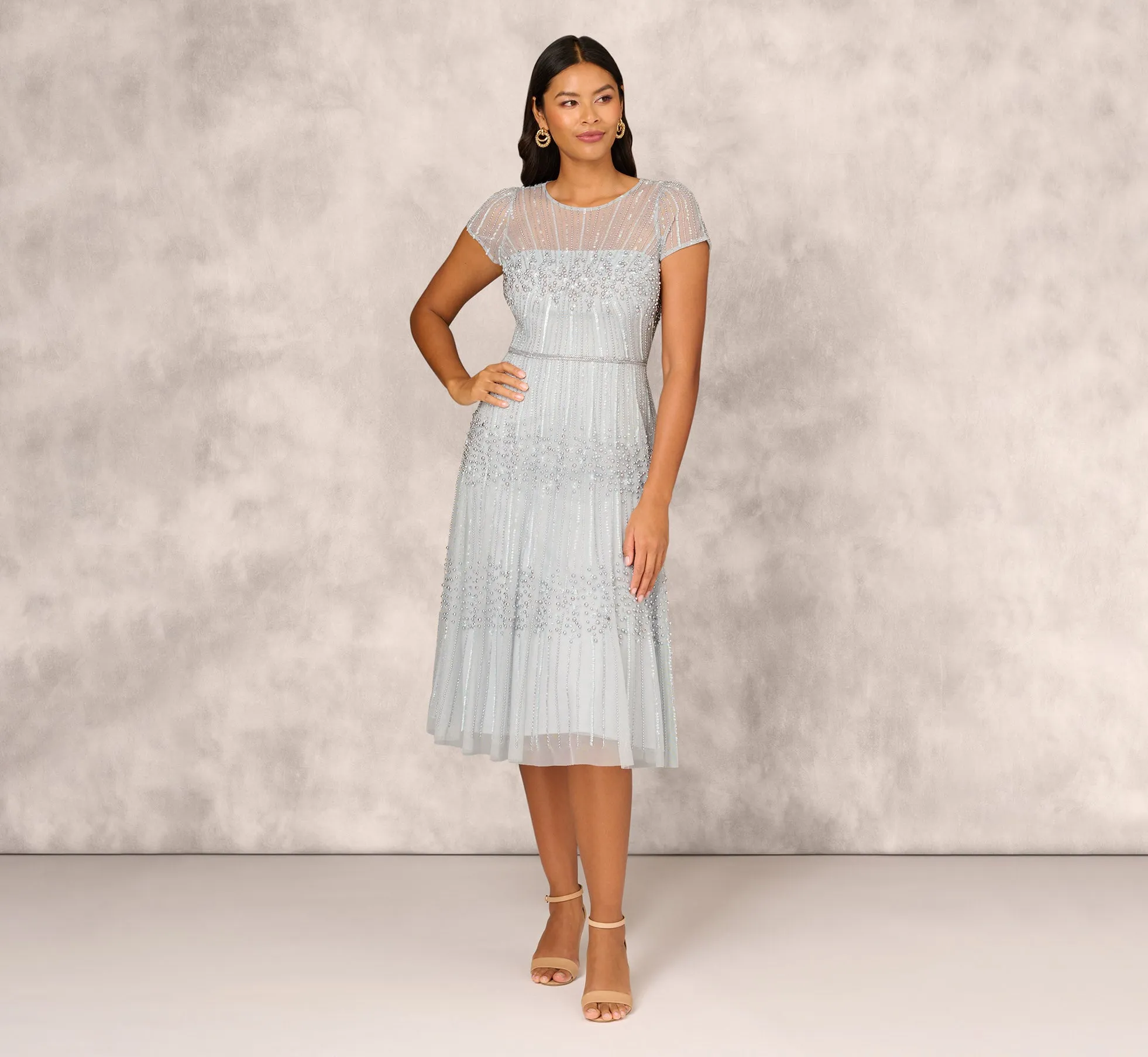 Beaded Short Sleeve Midi Dress With Sheer Details In Snow Globe sold by Adrianna Papell