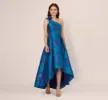 Floral Jacquard One Shoulder High Low Gown With Rosette Accent In Teal Blue sold by Adrianna Papell